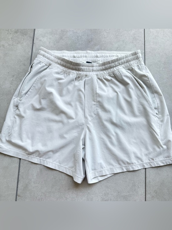 lululemon athletica Other - Lululemon men’s shorts medium light beige elastic waist zipper logo pull on